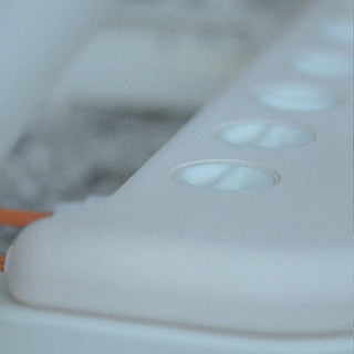 Somato Reformer’s twist dial for adjusting resistance, designed with built-in safety lock.